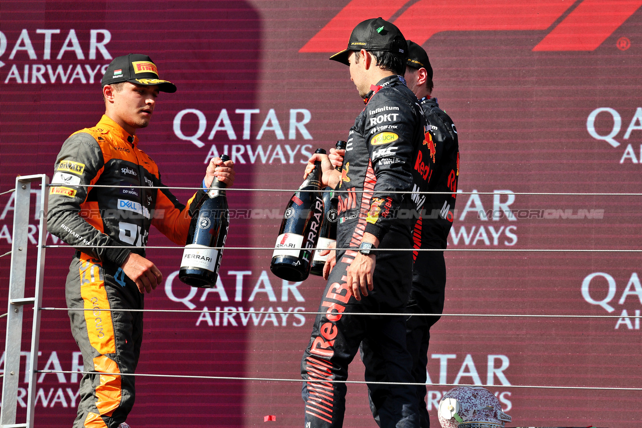 GP UNGHERIA, The podium (L to R): Lando Norris (GBR) McLaren with Sergio Perez (MEX) Red Bull Racing e vincitore Max Verstappen (NLD) Red Bull Racing.

23.07.2023. Formula 1 World Championship, Rd 12, Hungarian Grand Prix, Budapest, Hungary, Gara Day.

- www.xpbimages.com, EMail: requests@xpbimages.com © Copyright: Moy / XPB Images