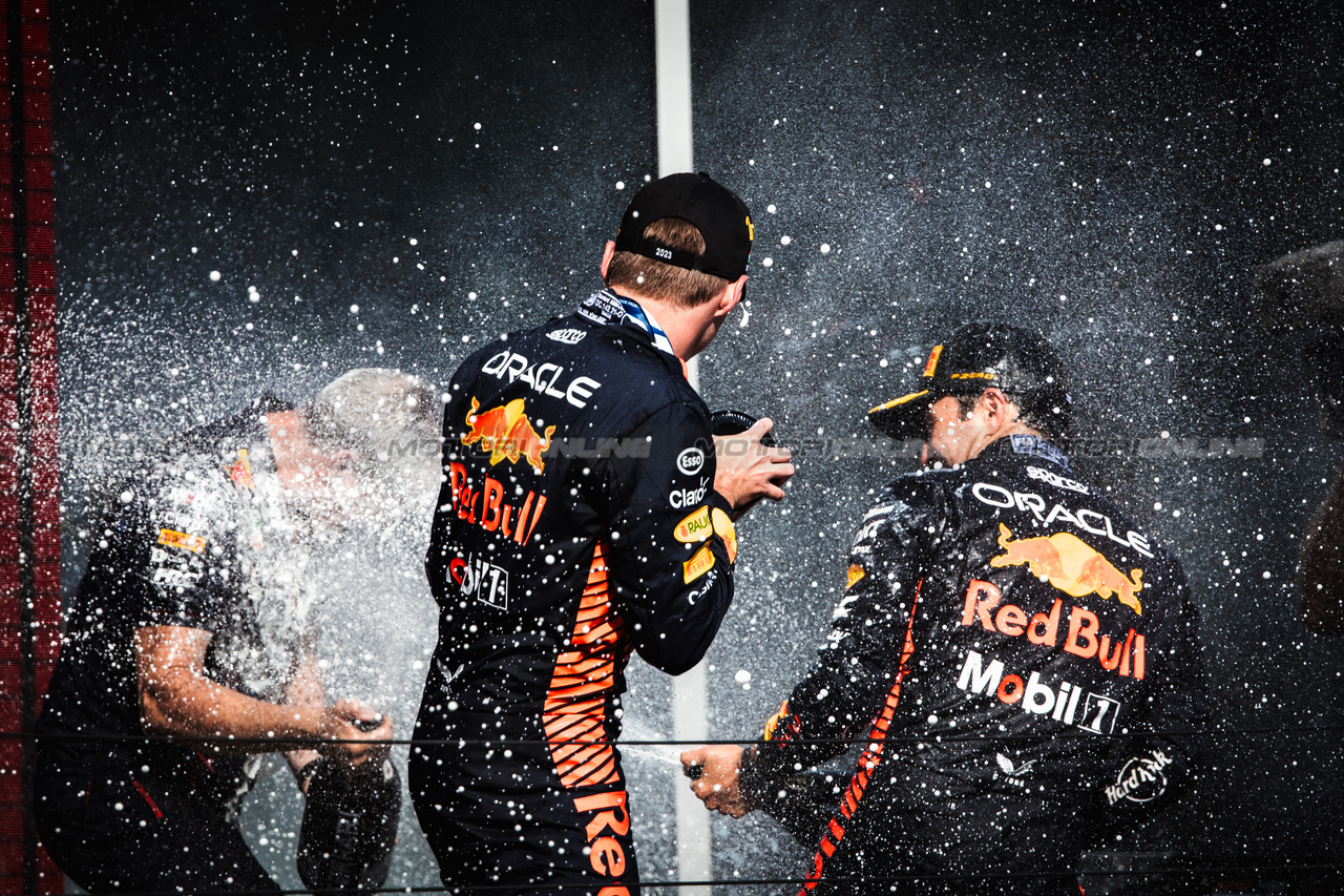 GP UNGHERIA, Gara winner Max Verstappen (NLD) Red Bull Racing celebrates on the podium with Paul Monaghan (GBR) Red Bull Racing Chief Engineer e team mate Sergio Perez (MEX) Red Bull Racing.

23.07.2023. Formula 1 World Championship, Rd 12, Hungarian Grand Prix, Budapest, Hungary, Gara Day.

- www.xpbimages.com, EMail: requests@xpbimages.com © Copyright: Bearne / XPB Images