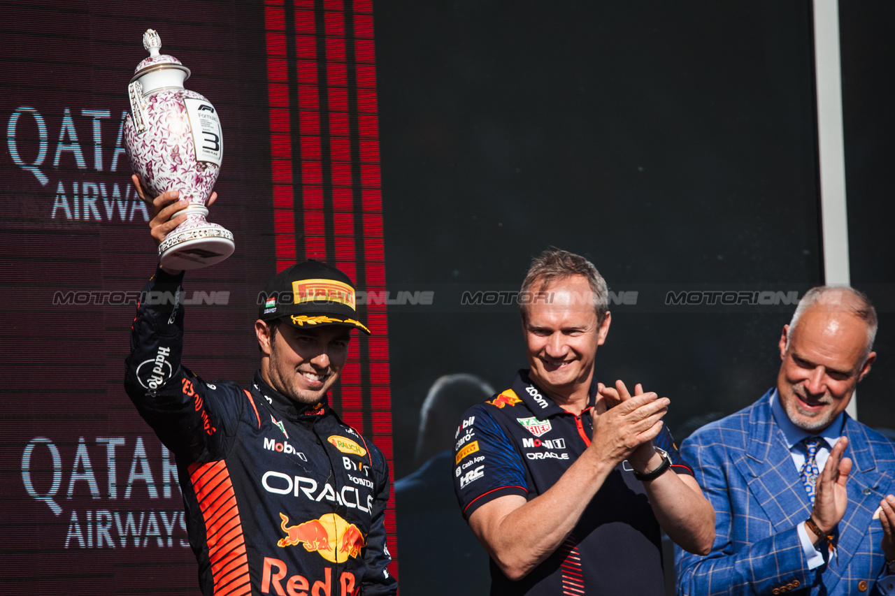 GP UNGHERIA, Sergio Perez (MEX) Red Bull Racing celebrates his third position on the podium.

23.07.2023. Formula 1 World Championship, Rd 12, Hungarian Grand Prix, Budapest, Hungary, Gara Day.

- www.xpbimages.com, EMail: requests@xpbimages.com © Copyright: Bearne / XPB Images