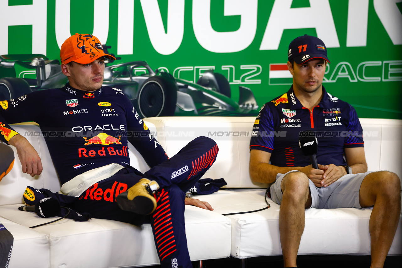 GP UNGHERIA, (L to R): Max Verstappen (NLD) Red Bull Racing e Sergio Perez (MEX) Red Bull Racing in the post race FIA Press Conference.

23.07.2023. Formula 1 World Championship, Rd 12, Hungarian Grand Prix, Budapest, Hungary, Gara Day.

- www.xpbimages.com, EMail: requests@xpbimages.com © Copyright: XPB Images