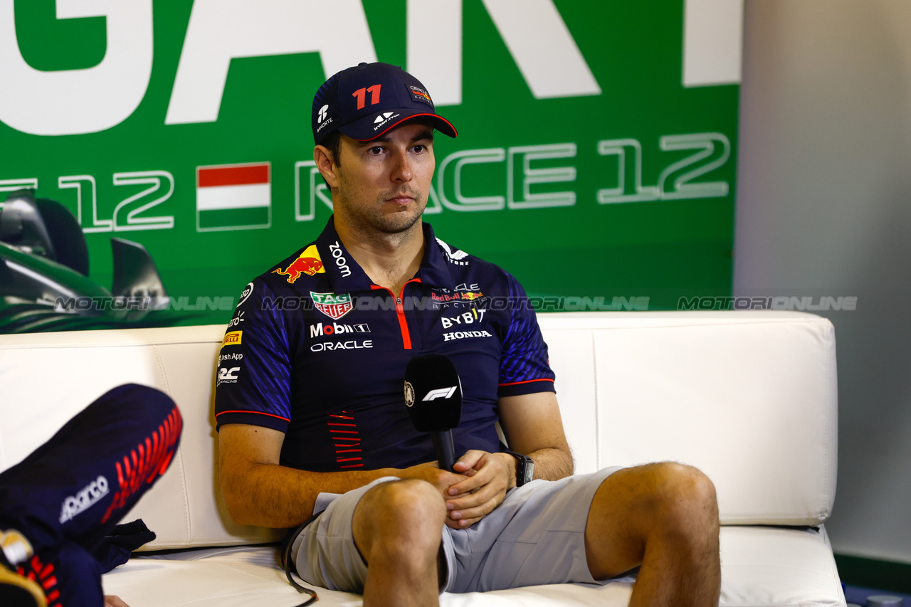 GP UNGHERIA, Sergio Perez (MEX) Red Bull Racing, in the post race FIA Press Conference.

23.07.2023. Formula 1 World Championship, Rd 12, Hungarian Grand Prix, Budapest, Hungary, Gara Day.

- www.xpbimages.com, EMail: requests@xpbimages.com © Copyright: XPB Images