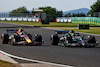 GP UNGHERIA, Sergio Perez (MEX) Red Bull Racing RB19 e Lewis Hamilton (GBR) Mercedes AMG F1 W14 battle for position.
23.07.2023. Formula 1 World Championship, Rd 12, Hungarian Grand Prix, Budapest, Hungary, Gara Day.
 - www.xpbimages.com, EMail: requests@xpbimages.com © Copyright: Coates / XPB Images