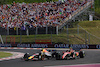 GP UNGHERIA, Sergio Perez (MEX) Red Bull Racing RB19 e Carlos Sainz Jr (ESP) Ferrari SF-23 battle for position.
23.07.2023. Formula 1 World Championship, Rd 12, Hungarian Grand Prix, Budapest, Hungary, Gara Day.
- www.xpbimages.com, EMail: requests@xpbimages.com © Copyright: Charniaux / XPB Images