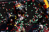 GP UNGHERIA, Max Verstappen (NLD) Red Bull Racing retrieves his broken trophy on the podium with Sergio Perez (MEX) Red Bull Racing e Lando Norris (GBR) McLaren.
23.07.2023. Formula 1 World Championship, Rd 12, Hungarian Grand Prix, Budapest, Hungary, Gara Day.
 - www.xpbimages.com, EMail: requests@xpbimages.com © Copyright: Coates / XPB Images