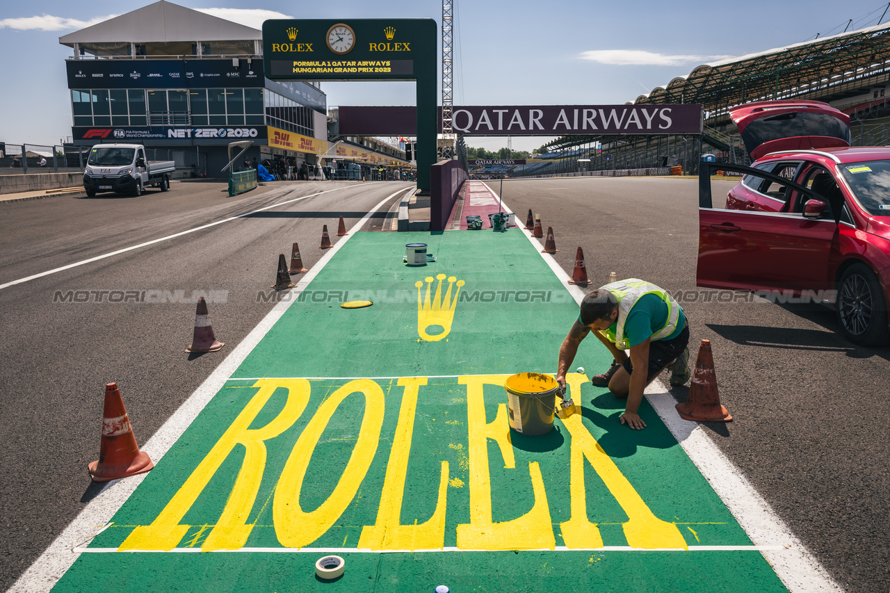 GP UNGHERIA, Circuit Atmosfera - Rolex branding painted on the circuit.

20.07.2023. Formula 1 World Championship, Rd 12, Hungarian Grand Prix, Budapest, Hungary, Preparation Day.

- www.xpbimages.com, EMail: requests@xpbimages.com © Copyright: Bearne / XPB Images