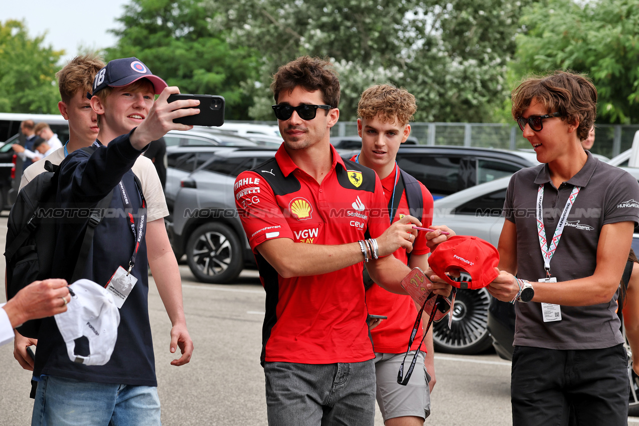 GP UNGHERIA, Charles Leclerc (MON) Ferrari with fans.

21.07.2023. Formula 1 World Championship, Rd 12, Hungarian Grand Prix, Budapest, Hungary, Practice Day.

- www.xpbimages.com, EMail: requests@xpbimages.com © Copyright: Moy / XPB Images