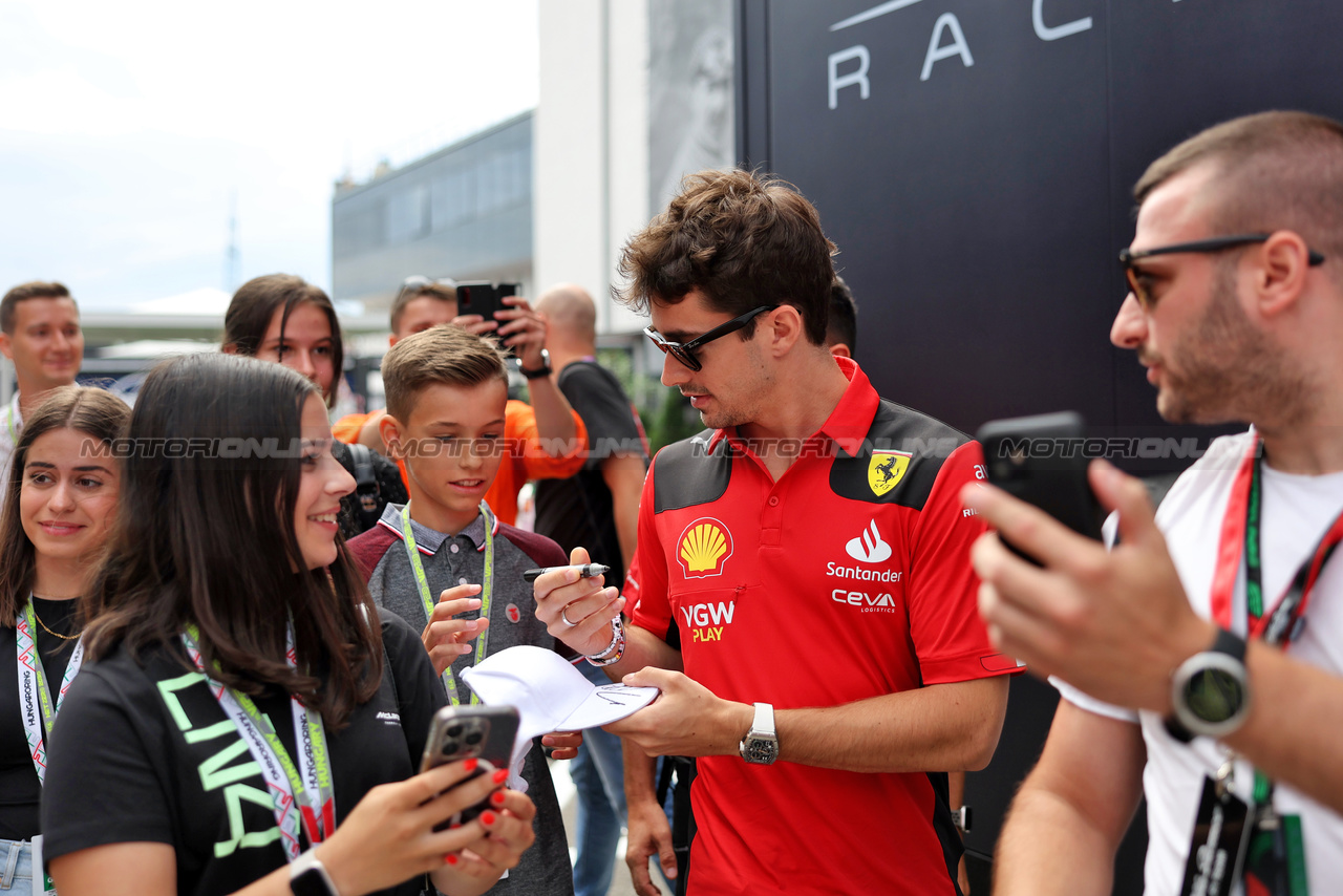 GP UNGHERIA, Charles Leclerc (MON) Ferrari with fans.

21.07.2023. Formula 1 World Championship, Rd 12, Hungarian Grand Prix, Budapest, Hungary, Practice Day.

- www.xpbimages.com, EMail: requests@xpbimages.com © Copyright: Bearne / XPB Images