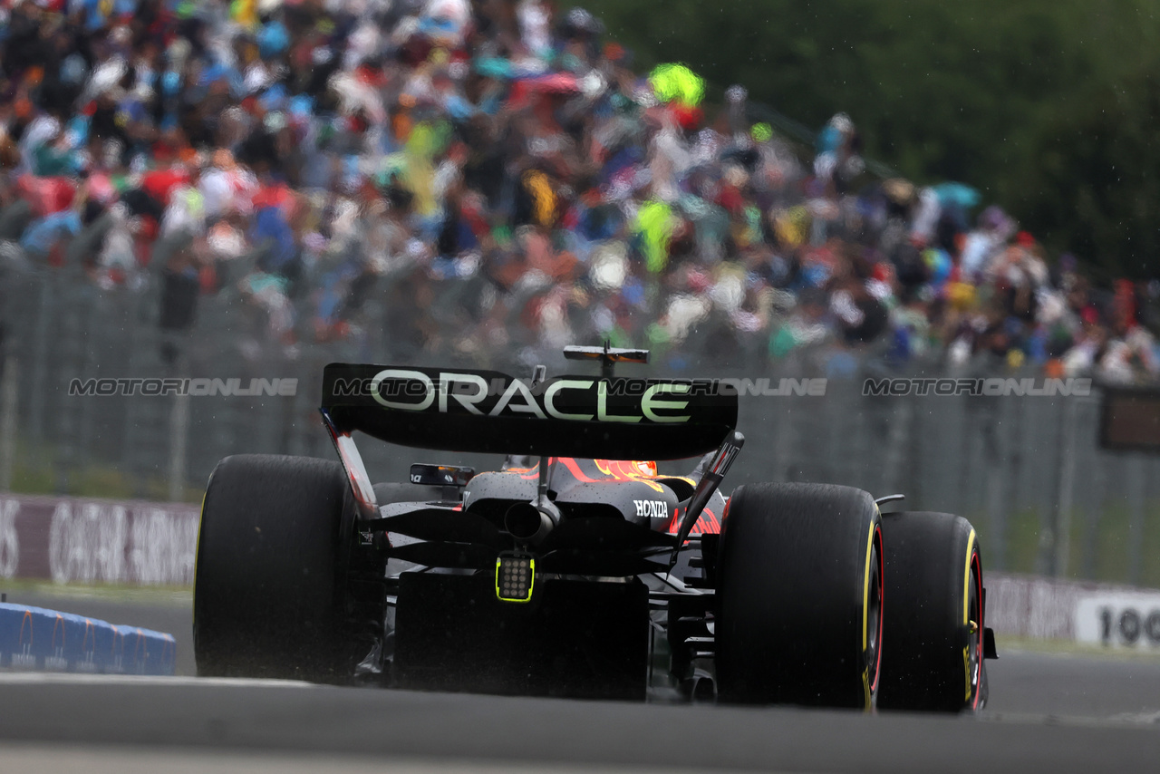 GP UNGHERIA, Max Verstappen (NLD) Red Bull Racing RB19 leaves the pits.

21.07.2023. Formula 1 World Championship, Rd 12, Hungarian Grand Prix, Budapest, Hungary, Practice Day.

- www.xpbimages.com, EMail: requests@xpbimages.com © Copyright: Bearne / XPB Images