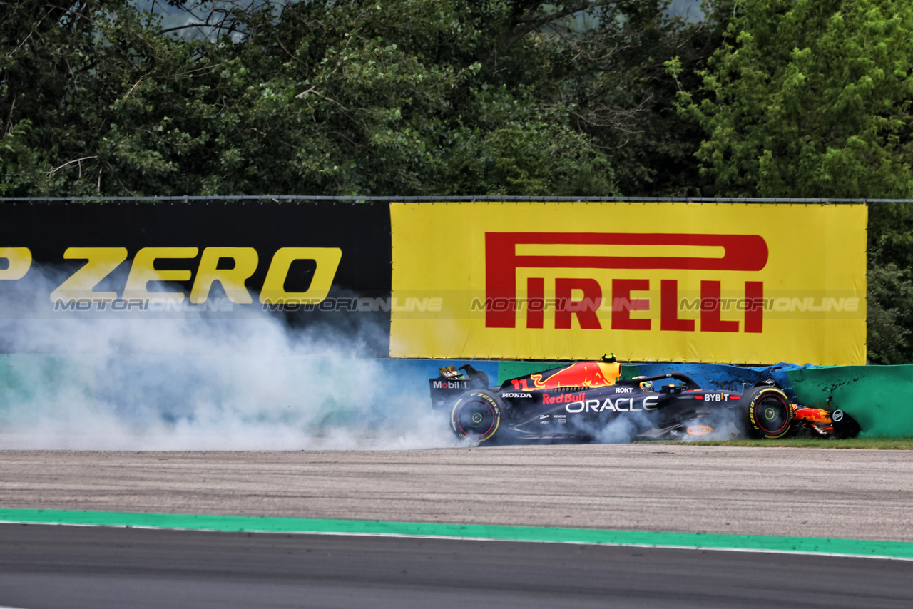 GP UNGHERIA, Sergio Perez (MEX) Red Bull Racing RB19 crashed in the first practice session.

21.07.2023. Formula 1 World Championship, Rd 12, Hungarian Grand Prix, Budapest, Hungary, Practice Day.

- www.xpbimages.com, EMail: requests@xpbimages.com © Copyright: Moy / XPB Images