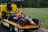 GP UNGHERIA, The damaged Red Bull Racing RB19 of Sergio Perez (MEX) is recovered back to the pits on the back of a truck. 
21.07.2023. Formula 1 World Championship, Rd 12, Hungarian Grand Prix, Budapest, Hungary, Practice Day.
 - www.xpbimages.com, EMail: requests@xpbimages.com © Copyright: Coates / XPB Images