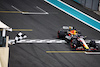 TEST ABU DHABI, Jake Dennis (GBR) Red Bull Racing RB19 Test Driver takes the chequered flag at the end of the session.

28.11.2023. Formula 1 Testing, Yas Marina Circuit, Abu Dhabi, Tuesday.
- www.xpbimages.com, EMail: requests@xpbimages.com © Copyright: Batchelor / XPB Images