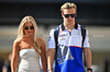 GP ABU DHABI, (L to R): Hannah St. John (USA) with her boyfriend Liam Lawson (NZL) RB.

08.12.2024. Formula 1 World Championship, Rd 24, Abu Dhabi Grand Prix, Yas Marina Circuit, Abu Dhabi, Gara Day.

- www.xpbimages.com, EMail: requests@xpbimages.com © Copyright: Price / XPB Images