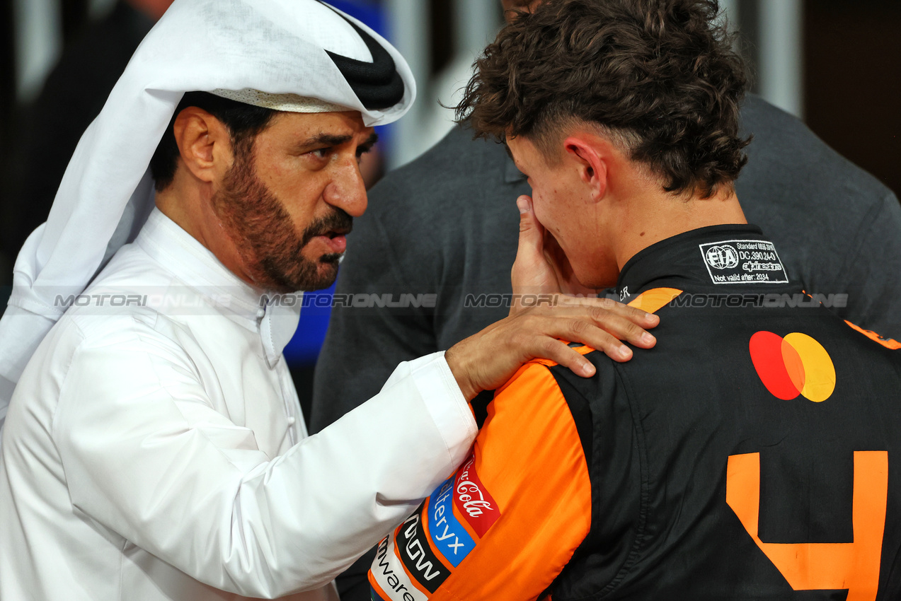 GP ABU DHABI, (L to R): Mohammed Bin Sulayem (UAE) FIA President with pole sitter Lando Norris (GBR) McLaren in qualifying parc ferme.

07.12.2024. Formula 1 World Championship, Rd 24, Abu Dhabi Grand Prix, Yas Marina Circuit, Abu Dhabi, Qualifiche Day.

 - www.xpbimages.com, EMail: requests@xpbimages.com © Copyright: Coates / XPB Images