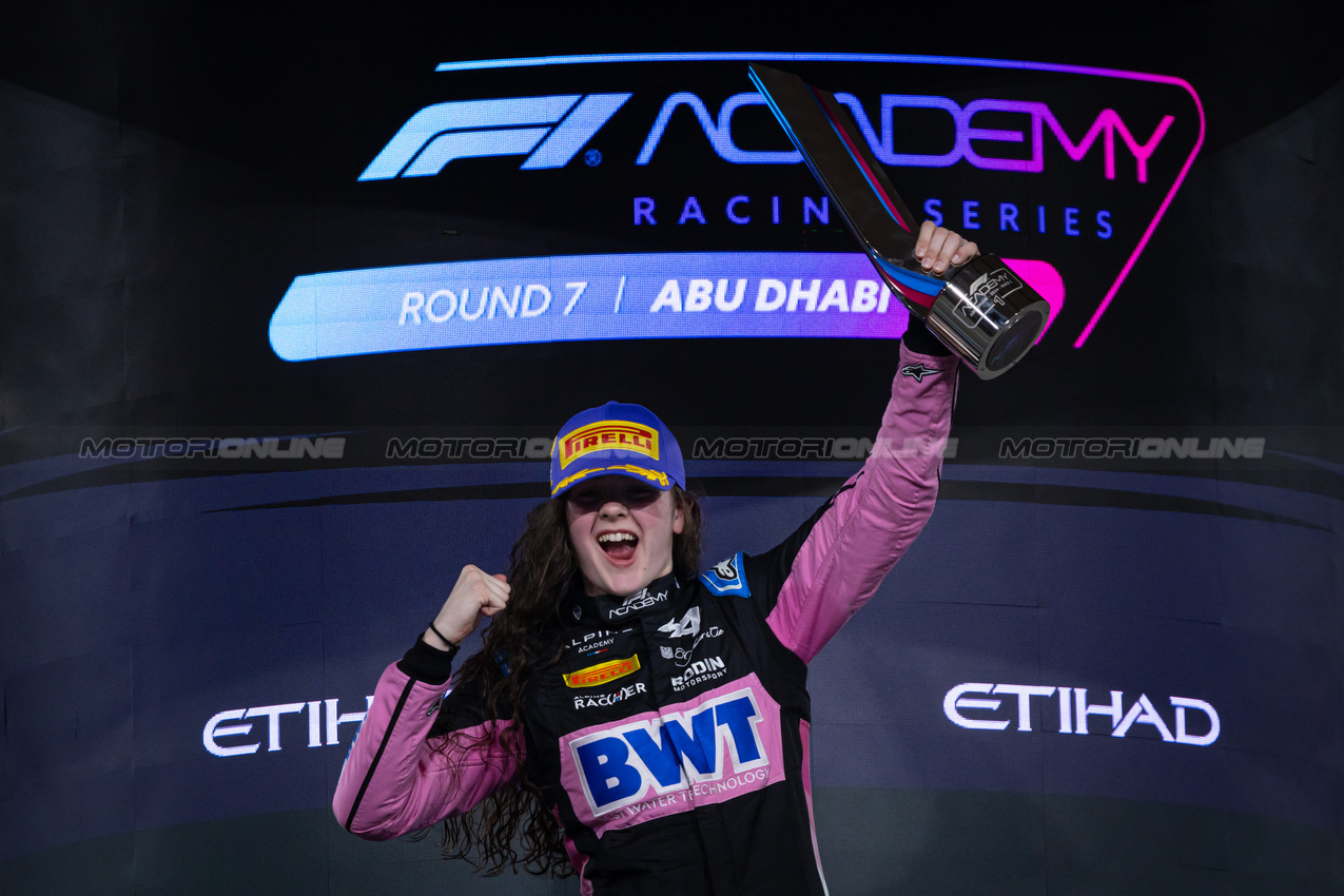 GP ABU DHABI, Gara winner Abbi Pulling (GBR) Rodin Motorsport celebrates on the podium.

21.09.2024. FIA Formula Academy, Rd 7, Gara 1, Yas Marina Circuit, Abu Dhabi, Saturday.

- www.xpbimages.com, EMail: requests@xpbimages.com Copyright: XPB Images