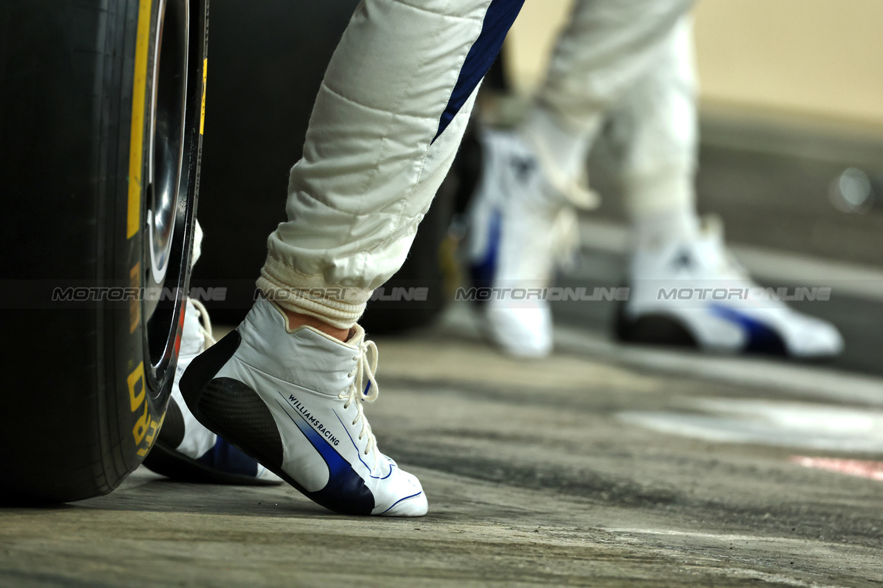 GP ABU DHABI, Williams Racing boots at a team photograph.

07.12.2024. Formula 1 World Championship, Rd 24, Abu Dhabi Grand Prix, Yas Marina Circuit, Abu Dhabi, Qualifiche Day.

 - www.xpbimages.com, EMail: requests@xpbimages.com © Copyright: Coates / XPB Images