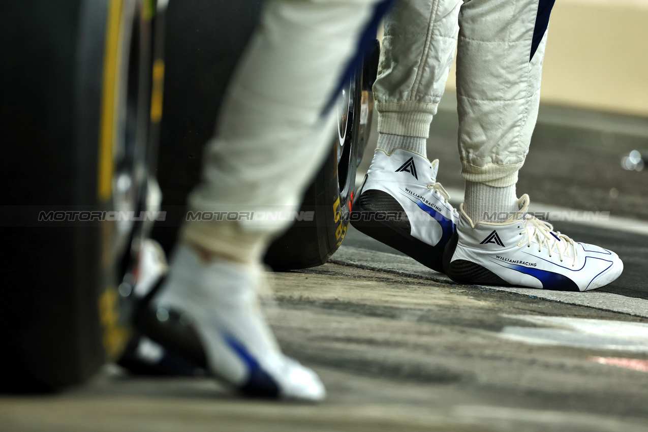 GP ABU DHABI, Williams Racing boots at a team photograph.

07.12.2024. Formula 1 World Championship, Rd 24, Abu Dhabi Grand Prix, Yas Marina Circuit, Abu Dhabi, Qualifiche Day.

 - www.xpbimages.com, EMail: requests@xpbimages.com © Copyright: Coates / XPB Images