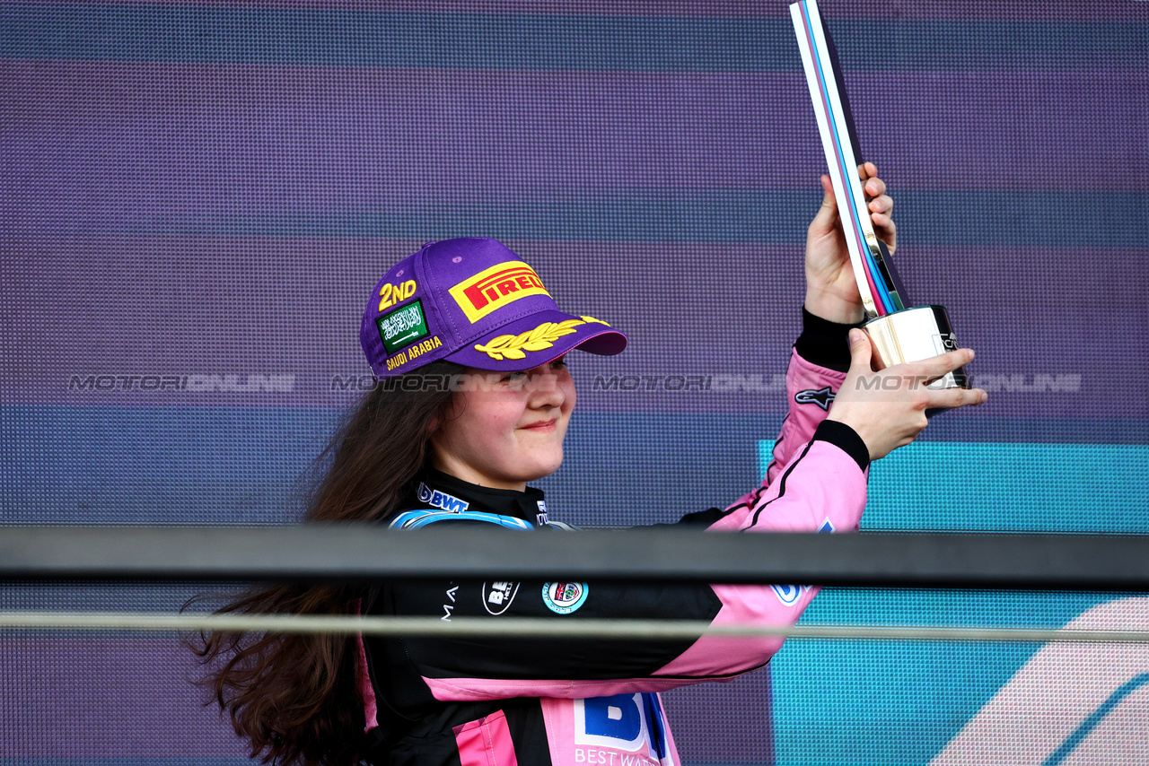 GP ARABIA SAUDITA, Abbi Pulling (GBR) Rodin Motorsport celebrates her second position on the podium.

08.03.2024. FIA Formula Academy, Rd 1, Gara 1, Jeddah, Saudi Arabia, Venerdi'.

- www.xpbimages.com, EMail: requests@xpbimages.com Copyright: XPB Images