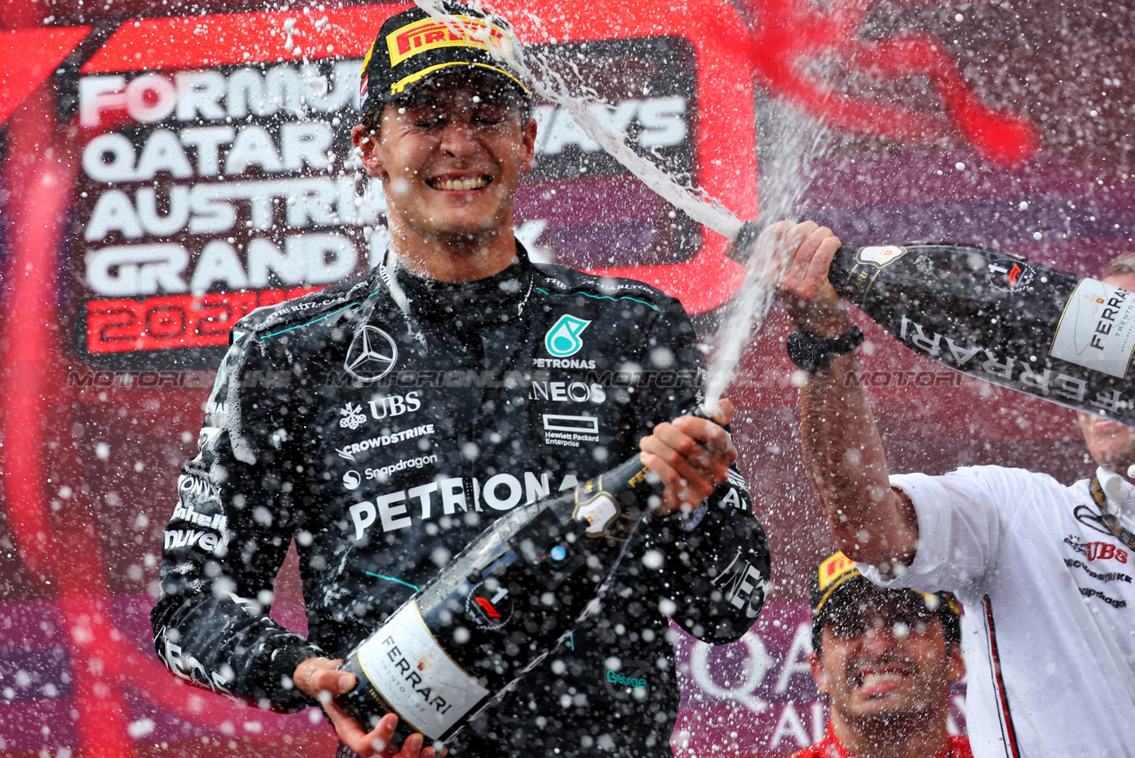 GP AUSTRIA, Gara winner George Russell (GBR) Mercedes AMG F1 celebrates on the podium.

30.06.2024. Formula 1 World Championship, Rd 11, Austrian Grand Prix, Spielberg, Austria, Gara Day.

- www.xpbimages.com, EMail: requests@xpbimages.com © Copyright: Batchelor / XPB Images