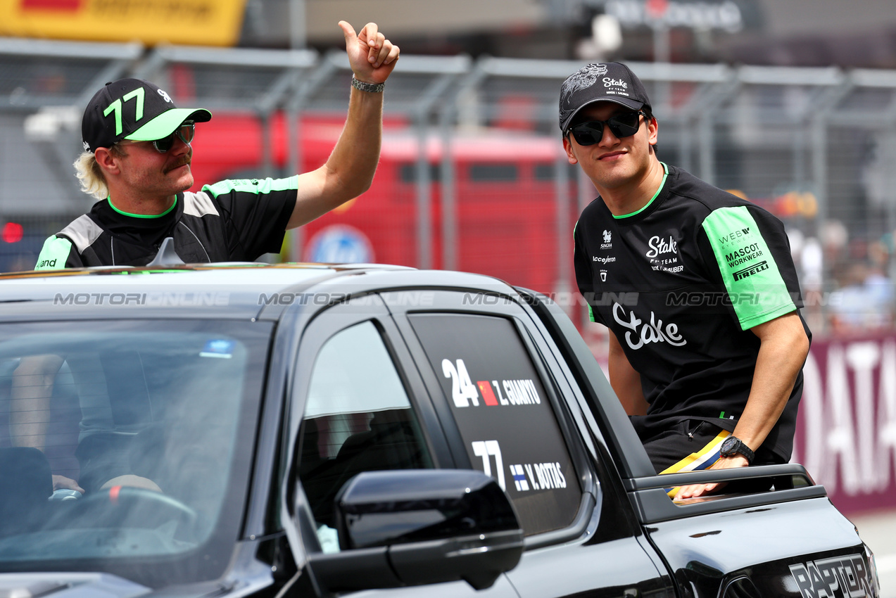 GP AUSTRIA, (L to R): Valtteri Bottas (FIN) Sauber e Zhou Guanyu (CHN) Sauber on the drivers' parade.

30.06.2024. Formula 1 World Championship, Rd 11, Austrian Grand Prix, Spielberg, Austria, Gara Day.

 - www.xpbimages.com, EMail: requests@xpbimages.com © Copyright: Coates / XPB Images