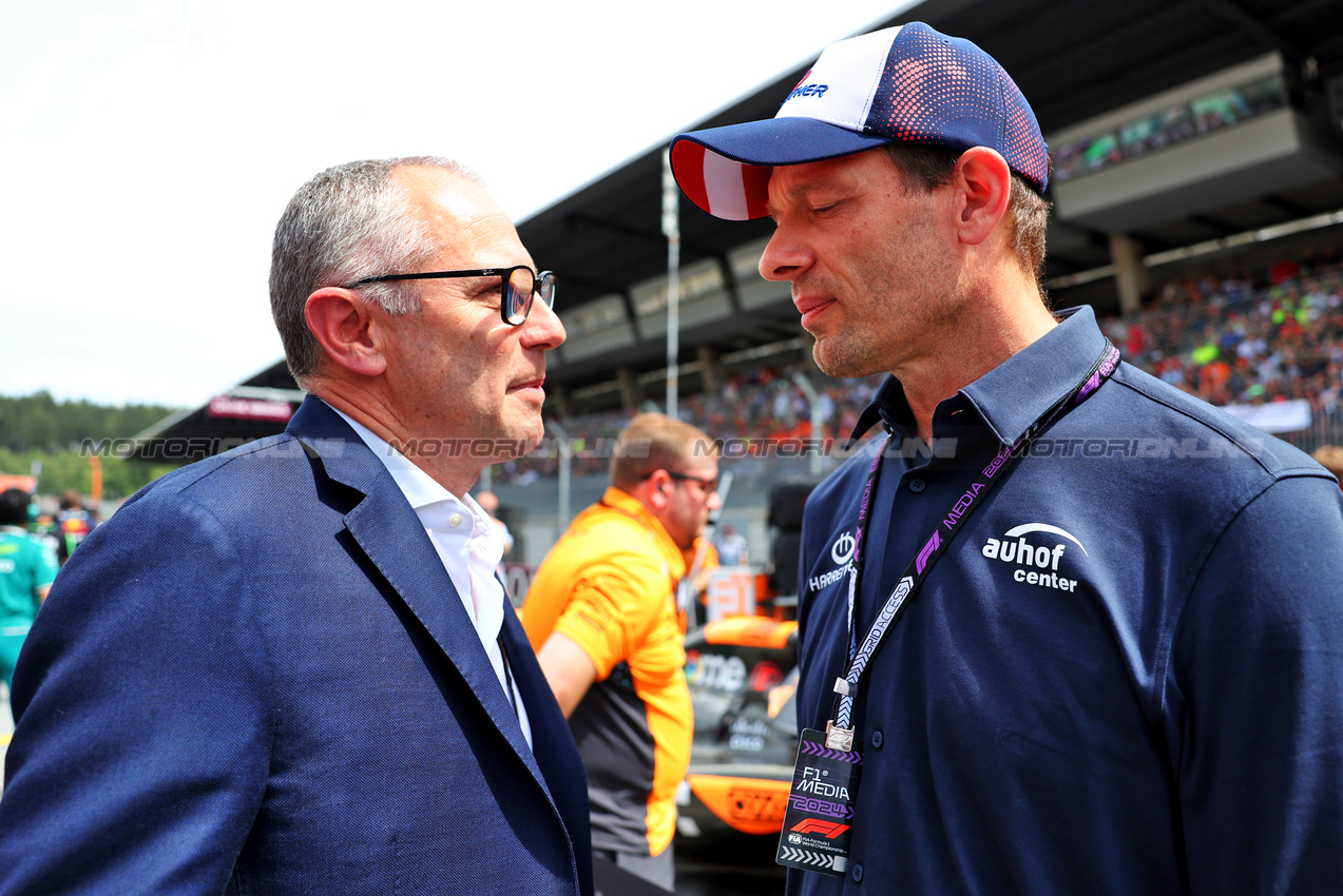 GP AUSTRIA, (L to R): Stefano Domenicali (ITA) Formula One President e CEO with Alex Wurz (AUT) GPDA Chairman on the grid.

30.06.2024. Formula 1 World Championship, Rd 11, Austrian Grand Prix, Spielberg, Austria, Gara Day.

- www.xpbimages.com, EMail: requests@xpbimages.com © Copyright: Batchelor / XPB Images