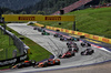 GP AUSTRIA, Sergio Perez (MEX) Red Bull Racing RB20 e Oscar Piastri (AUS) McLaren MCL38 at the partenza of the race.

30.06.2024. Formula 1 World Championship, Rd 11, Austrian Grand Prix, Spielberg, Austria, Gara Day.

 - www.xpbimages.com, EMail: requests@xpbimages.com © Copyright: Coates / XPB Images