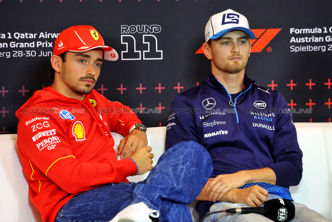 GP AUSTRIA, (L to R): Charles Leclerc (MON) Ferrari e Logan Sargeant (USA) Williams Racing in the FIA Press Conference.

27.06.2024. Formula 1 World Championship, Rd 11, Austrian Grand Prix, Spielberg, Austria, Preparation Day.

- www.xpbimages.com, EMail: requests@xpbimages.com © Copyright: Batchelor / XPB Images