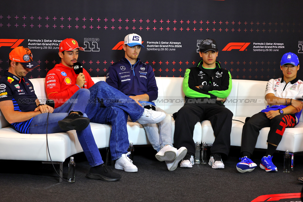 GP AUSTRIA, (L to R): Max Verstappen (NLD) Red Bull Racing; Charles Leclerc (MON) Ferrari; Logan Sargeant (USA) Williams Racing; Zhou Guanyu (CHN) Sauber; e Yuki Tsunoda (JPN) RB, in the FIA Press Conference.

27.06.2024. Formula 1 World Championship, Rd 11, Austrian Grand Prix, Spielberg, Austria, Preparation Day.

- www.xpbimages.com, EMail: requests@xpbimages.com © Copyright: Batchelor / XPB Images