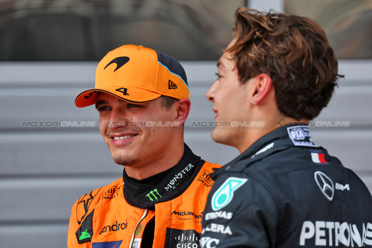 GP AUSTRIA, (L to R): Second placed Lando Norris (GBR) McLaren in qualifying parc ferme with third placed George Russell (GBR) Mercedes AMG F1.

29.06.2024. Formula 1 World Championship, Rd 11, Austrian Grand Prix, Spielberg, Austria, Sprint e Qualifiche Day.

- www.xpbimages.com, EMail: requests@xpbimages.com © Copyright: Batchelor / XPB Images