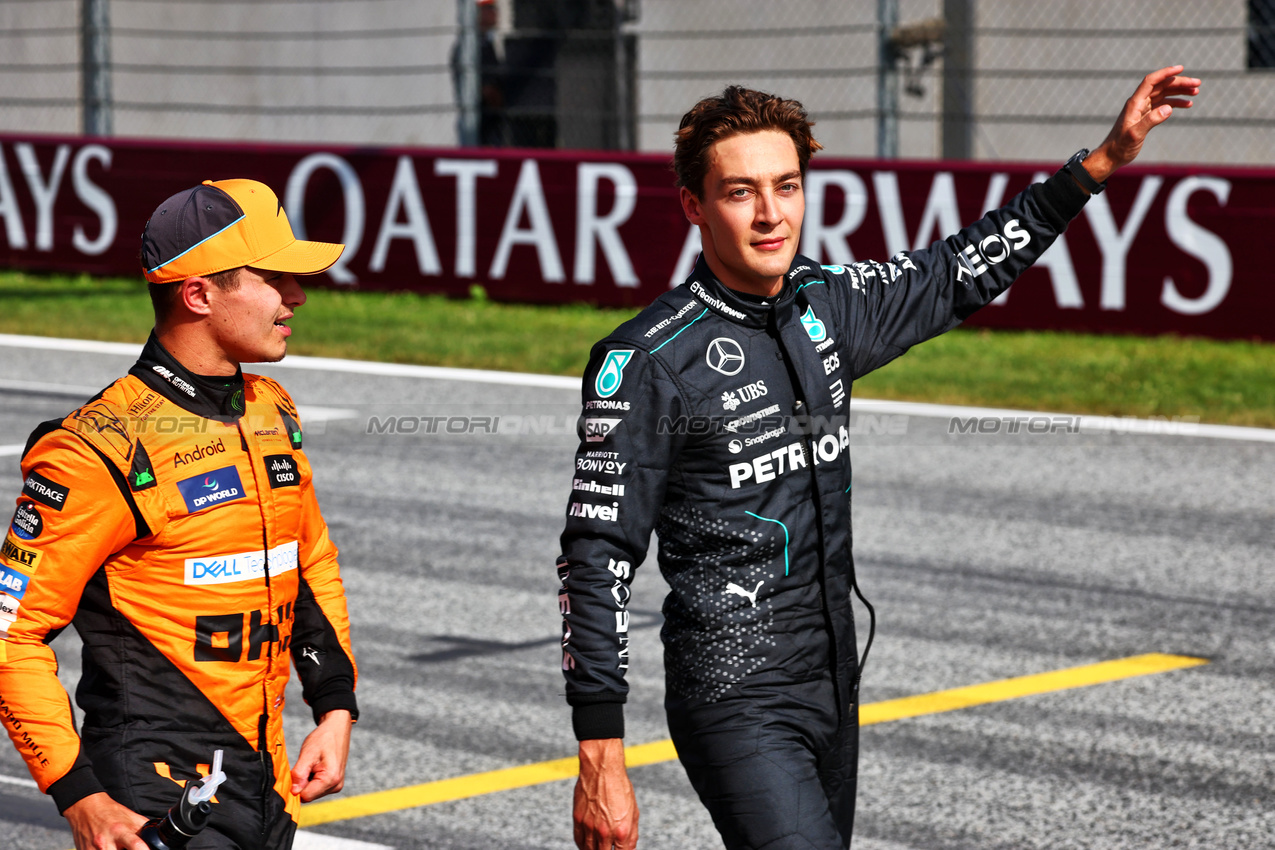 GP AUSTRIA, (L to R): second placed Lando Norris (GBR) McLaren with third placed George Russell (GBR) Mercedes AMG F1 in qualifying parc ferme.

29.06.2024. Formula 1 World Championship, Rd 11, Austrian Grand Prix, Spielberg, Austria, Sprint e Qualifiche Day.

 - www.xpbimages.com, EMail: requests@xpbimages.com © Copyright: Coates / XPB Images