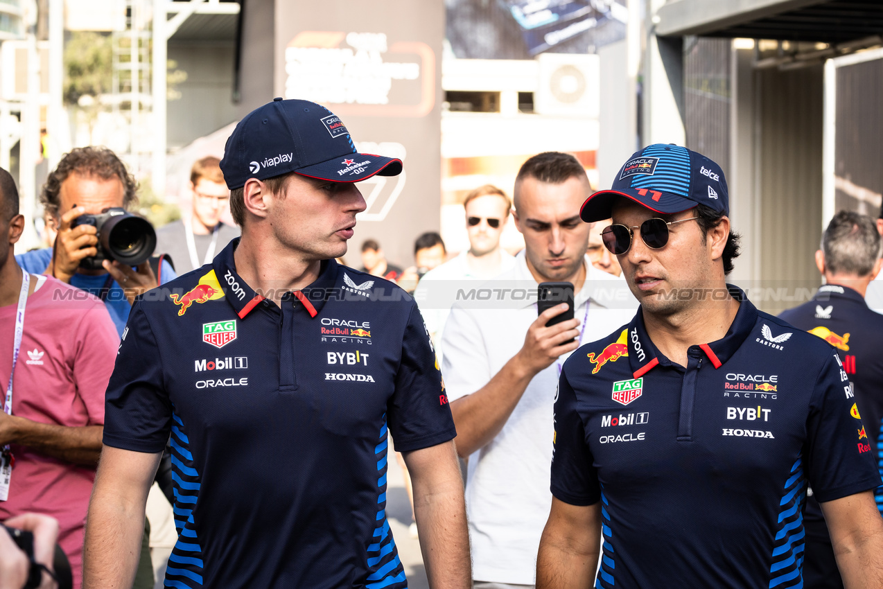 GP AZERBAIJAN, (L to R): Max Verstappen (NLD) Red Bull Racing with team mate Sergio Perez (MEX) Red Bull Racing.

12.09.2024. Formula 1 World Championship, Rd 17, Azerbaijan Grand Prix, Baku Street Circuit, Azerbaijan, Preparation Day.

- www.xpbimages.com, EMail: requests@xpbimages.com © Copyright: Bearne / XPB Images