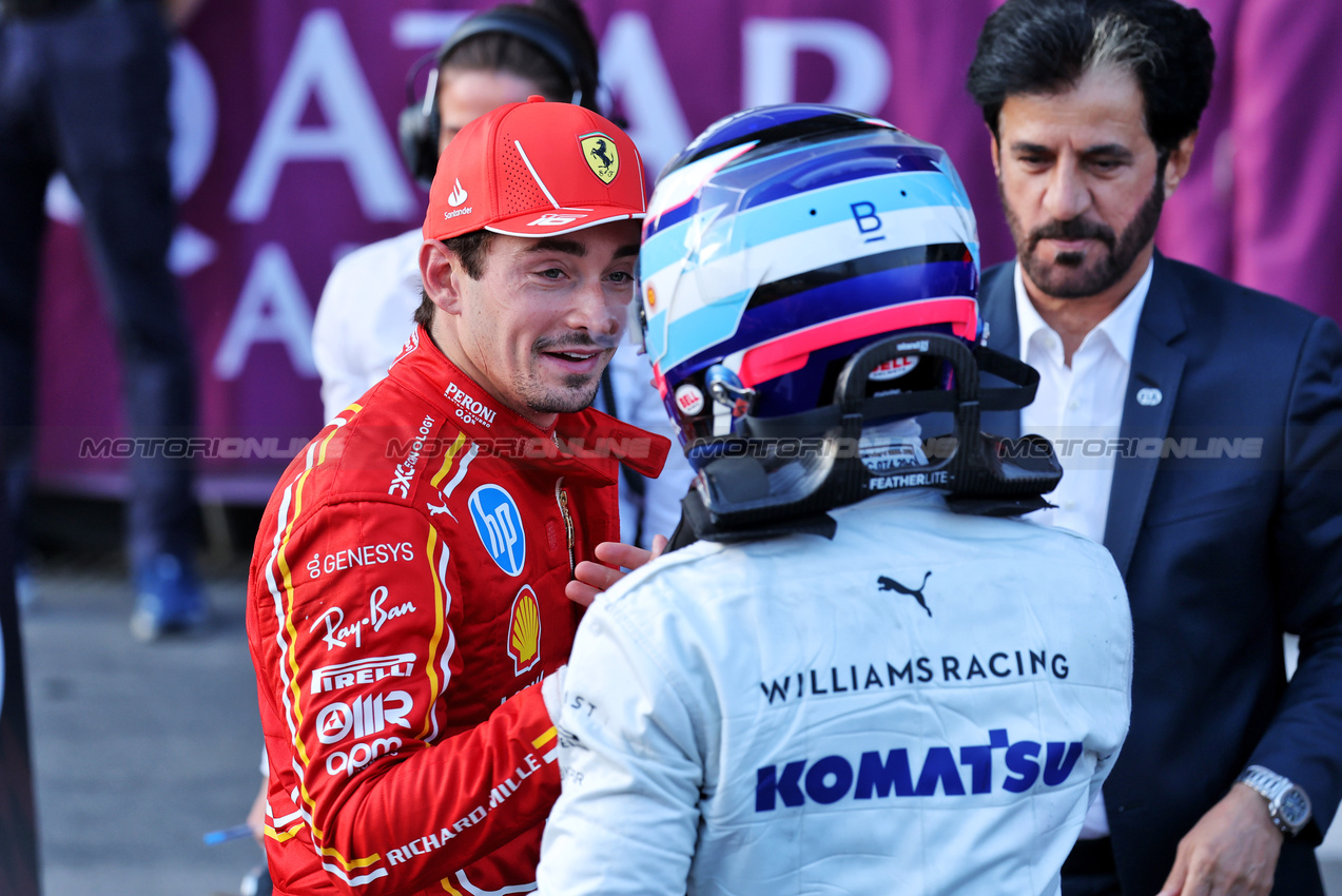 GP AZERBAIJAN, (L to R): Charles Leclerc (MON) Ferrari celebrates his pole position in qualifying parc ferme with Franco Colapinto (ARG) Williams Racing.

14.09.2024. Formula 1 World Championship, Rd 17, Azerbaijan Grand Prix, Baku Street Circuit, Azerbaijan, Qualifiche Day.

- www.xpbimages.com, EMail: requests@xpbimages.com © Copyright: Batchelor / XPB Images