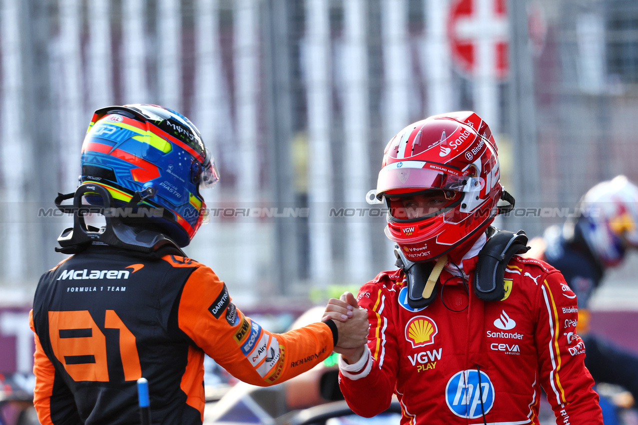 GP AZERBAIJAN, Charles Leclerc (MON) Ferrari (Right) celebrates his pole position in qualifying parc ferme with second placed Oscar Piastri (AUS) McLaren.

14.09.2024. Formula 1 World Championship, Rd 17, Azerbaijan Grand Prix, Baku Street Circuit, Azerbaijan, Qualifiche Day.

- www.xpbimages.com, EMail: requests@xpbimages.com © Copyright: Charniaux / XPB Images