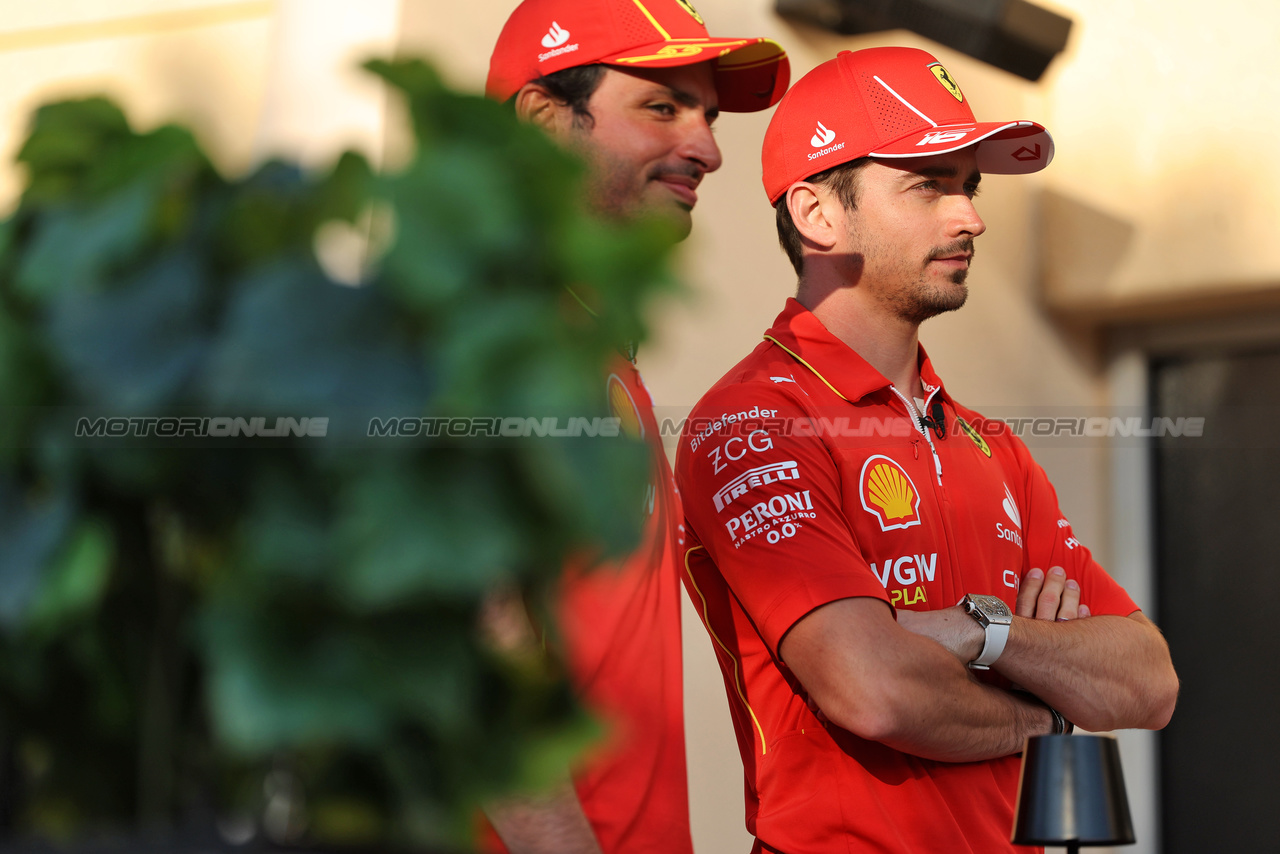 GP BAHRAIN, Charles Leclerc (MON) Ferrari with team mate Carlos Sainz Jr (ESP) Ferrari.

28.02.2024. Formula 1 World Championship, Rd 1, Bahrain Grand Prix, Sakhir, Bahrain, Preparation Day.

 - www.xpbimages.com, EMail: requests@xpbimages.com © Copyright: Staley / XPB Images