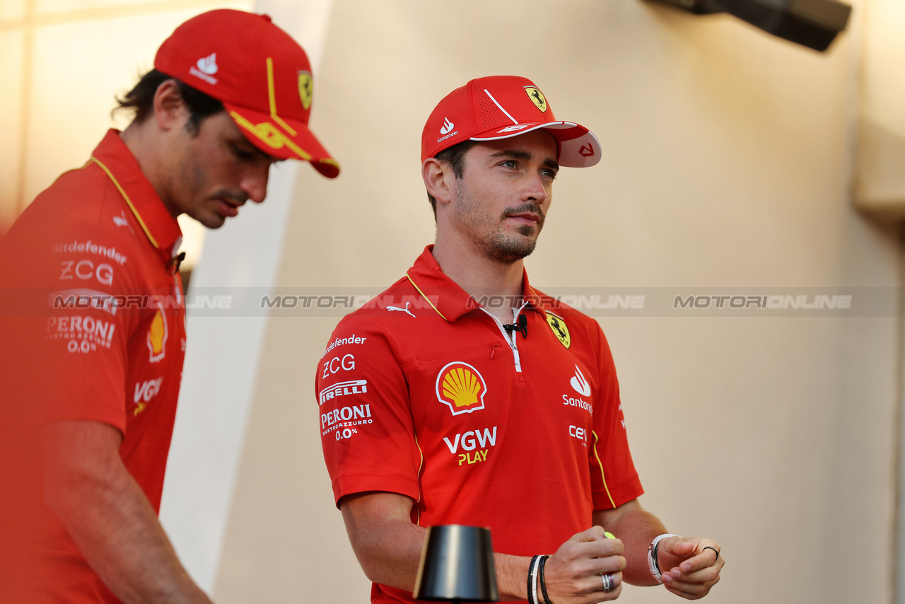 GP BAHRAIN, Charles Leclerc (MON) Ferrari with team mate Carlos Sainz Jr (ESP) Ferrari.

28.02.2024. Formula 1 World Championship, Rd 1, Bahrain Grand Prix, Sakhir, Bahrain, Preparation Day.

 - www.xpbimages.com, EMail: requests@xpbimages.com © Copyright: Staley / XPB Images