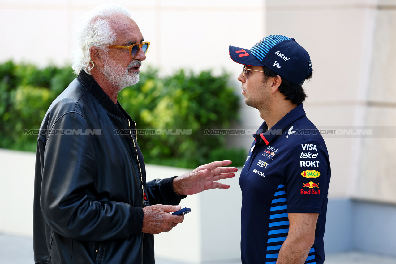 GP BAHRAIN, (L to R): Flavio Briatore (ITA) with Sergio Perez (MEX) Red Bull Racing.

02.03.2024. Formula 1 World Championship, Rd 1, Bahrain Grand Prix, Sakhir, Bahrain, Gara Day.

 - www.xpbimages.com, EMail: requests@xpbimages.com © Copyright: Coates / XPB Images