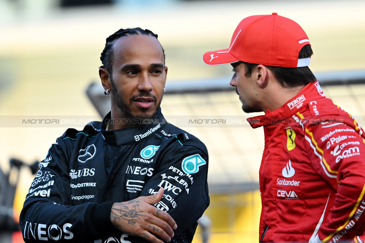 GP BAHRAIN, (L to R): Lewis Hamilton (GBR) Mercedes AMG F1 with Charles Leclerc (MON) Ferrari on the drivers' parade.

02.03.2024. Formula 1 World Championship, Rd 1, Bahrain Grand Prix, Sakhir, Bahrain, Gara Day.

- www.xpbimages.com, EMail: requests@xpbimages.com © Copyright: Price / XPB Images