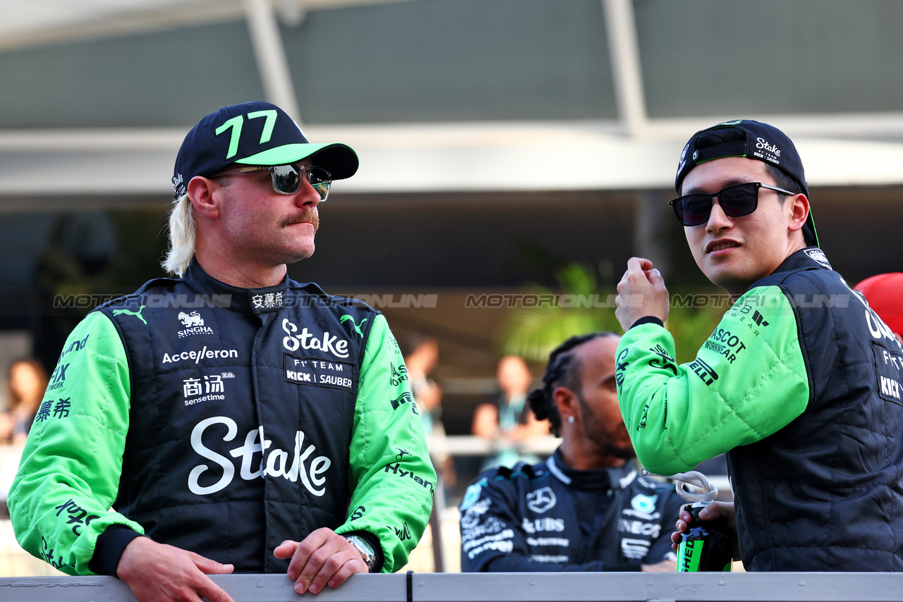 GP BAHRAIN, (L to R): Valtteri Bottas (FIN) Sauber with team mate Zhou Guanyu (CHN) Sauber on the drivers' parade.

02.03.2024. Formula 1 World Championship, Rd 1, Bahrain Grand Prix, Sakhir, Bahrain, Gara Day.

 - www.xpbimages.com, EMail: requests@xpbimages.com © Copyright: Coates / XPB Images