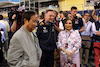 GP BAHRAIN, Christian Horner (GBR) Red Bull Racing Team Principal with Chalerm Yoovidhya (THA) Red Bull Racing Co-Owner e sua moglie on the grid.
02.03.2024. Formula 1 World Championship, Rd 1, Bahrain Grand Prix, Sakhir, Bahrain, Gara Day.
 - www.xpbimages.com, EMail: requests@xpbimages.com © Copyright: Staley / XPB Images