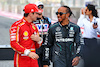 GP BAHRAIN, (L to R): Charles Leclerc (MON) Ferrari with Lewis Hamilton (GBR) Mercedes AMG F1.
02.03.2024. Formula 1 World Championship, Rd 1, Bahrain Grand Prix, Sakhir, Bahrain, Gara Day.
 - www.xpbimages.com, EMail: requests@xpbimages.com © Copyright: Coates / XPB Images