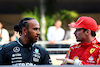 GP BAHRAIN, (L to R): Lewis Hamilton (GBR) Mercedes AMG F1 with Charles Leclerc (MON) Ferrari.
02.03.2024. Formula 1 World Championship, Rd 1, Bahrain Grand Prix, Sakhir, Bahrain, Gara Day.
 - www.xpbimages.com, EMail: requests@xpbimages.com © Copyright: Coates / XPB Images