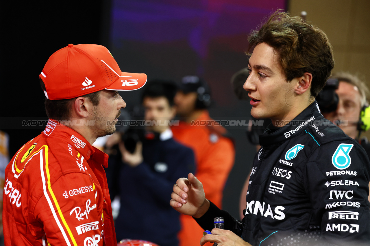 GP BAHRAIN, (L to R): Charles Leclerc (MON) Ferrari with George Russell (GBR) Mercedes AMG F1 in qualifying parc ferme.

01.03.2024. Formula 1 World Championship, Rd 1, Bahrain Grand Prix, Sakhir, Bahrain, Qualifiche Day.

- www.xpbimages.com, EMail: requests@xpbimages.com © Copyright: Batchelor / XPB Images