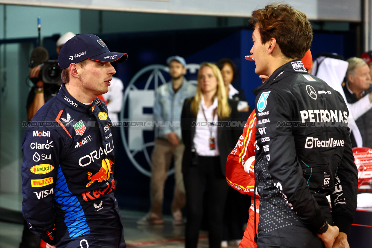 GP BAHRAIN, (L to R): pole sitter Max Verstappen (NLD) Red Bull Racing with Charles Leclerc (MON) Ferrari e George Russell (GBR) Mercedes AMG F1 in qualifying parc ferme.

01.03.2024. Formula 1 World Championship, Rd 1, Bahrain Grand Prix, Sakhir, Bahrain, Qualifiche Day.

- www.xpbimages.com, EMail: requests@xpbimages.com © Copyright: Batchelor / XPB Images