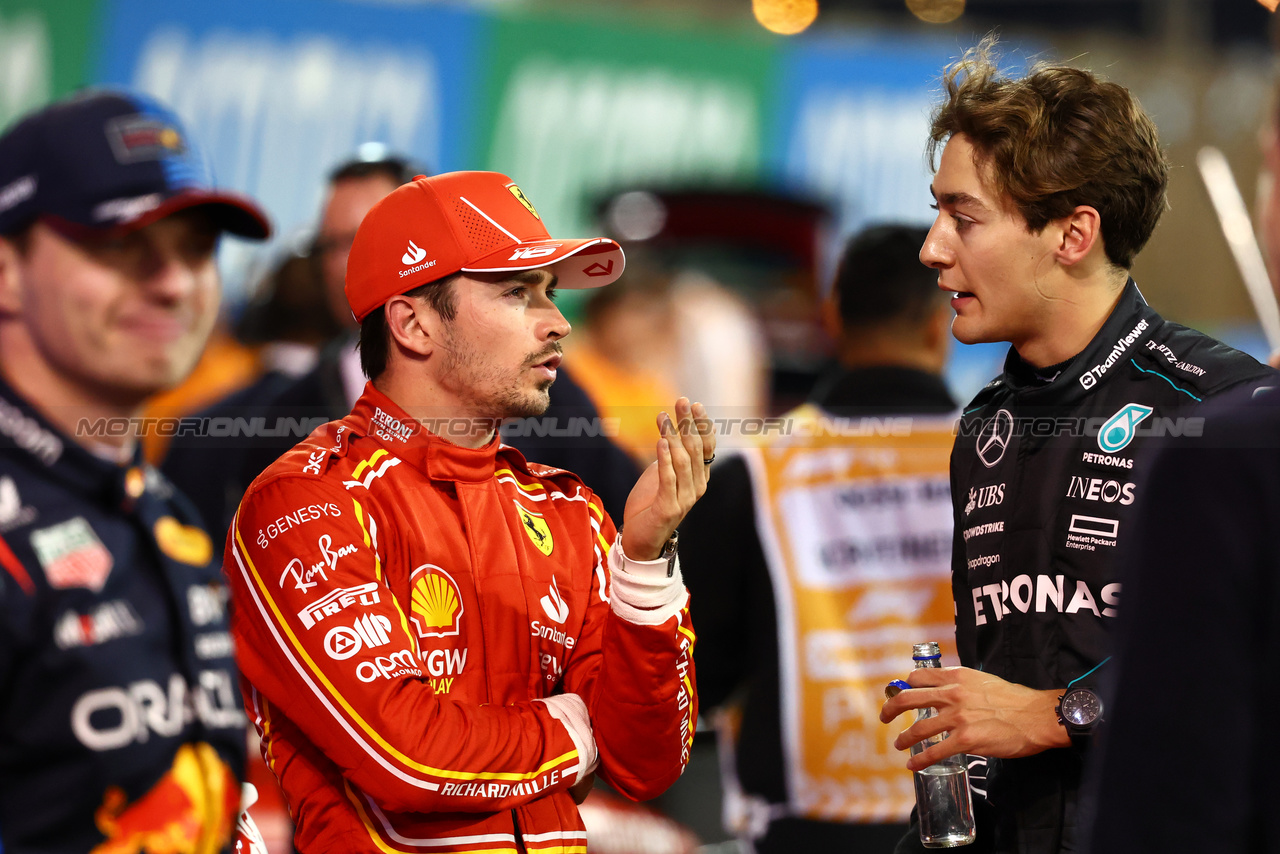 GP BAHRAIN, (L to R): Charles Leclerc (MON) Ferrari with George Russell (GBR) Mercedes AMG F1 in qualifying parc ferme.

01.03.2024. Formula 1 World Championship, Rd 1, Bahrain Grand Prix, Sakhir, Bahrain, Qualifiche Day.

- www.xpbimages.com, EMail: requests@xpbimages.com © Copyright: Charniaux / XPB Images