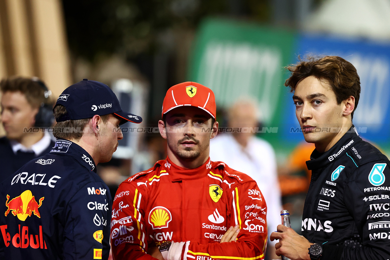 GP BAHRAIN, (L to R): pole sitter Max Verstappen (NLD) Red Bull Racing with Charles Leclerc (MON) Ferrari e George Russell (GBR) Mercedes AMG F1 in qualifying parc ferme.

01.03.2024. Formula 1 World Championship, Rd 1, Bahrain Grand Prix, Sakhir, Bahrain, Qualifiche Day.

- www.xpbimages.com, EMail: requests@xpbimages.com © Copyright: Charniaux / XPB Images