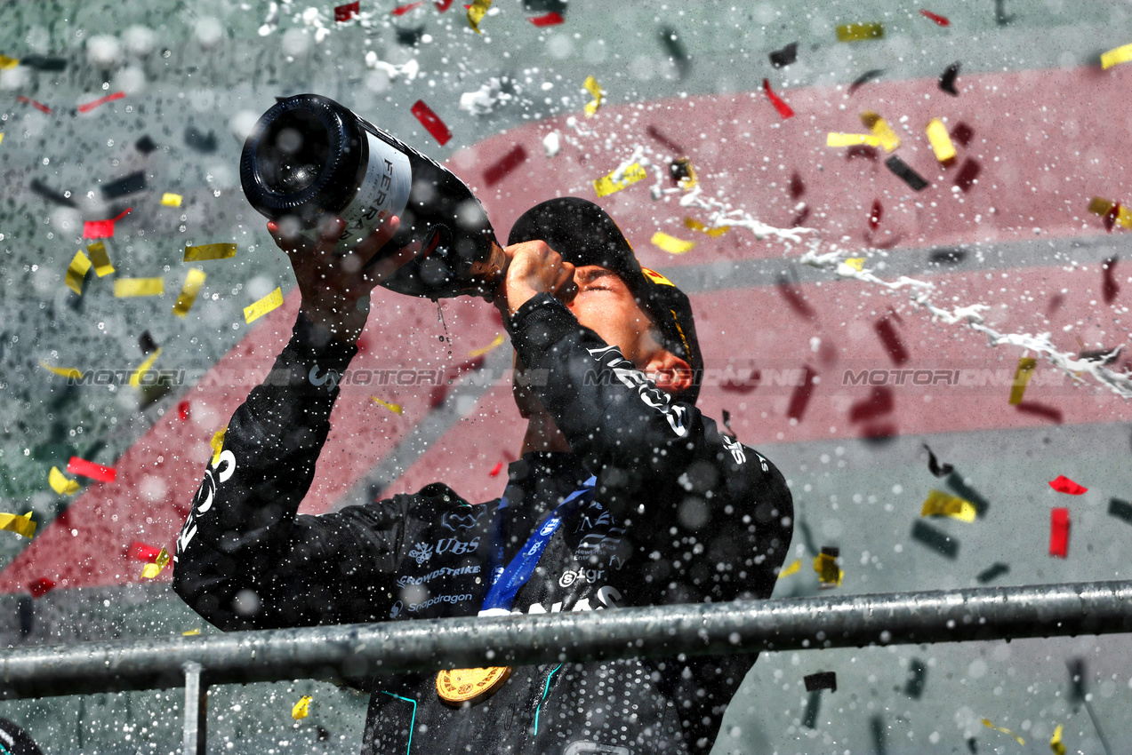 GP BELGIO, Gara winner George Russell (GBR) Mercedes AMG F1 celebrates on the podium.

28.07.2024. Formula 1 World Championship, Rd 14, Belgian Grand Prix, Spa Francorchamps, Belgium, Gara Day.

- www.xpbimages.com, EMail: requests@xpbimages.com © Copyright: Charniaux / XPB Images