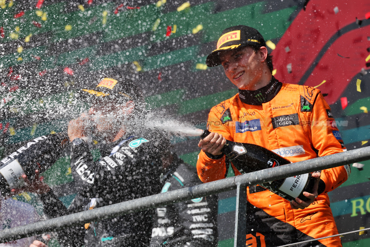 GP BELGIO, Oscar Piastri (AUS) McLaren celebrates his third position on the podium.

28.07.2024. Formula 1 World Championship, Rd 14, Belgian Grand Prix, Spa Francorchamps, Belgium, Gara Day.

- www.xpbimages.com, EMail: requests@xpbimages.com © Copyright: Rew / XPB Images