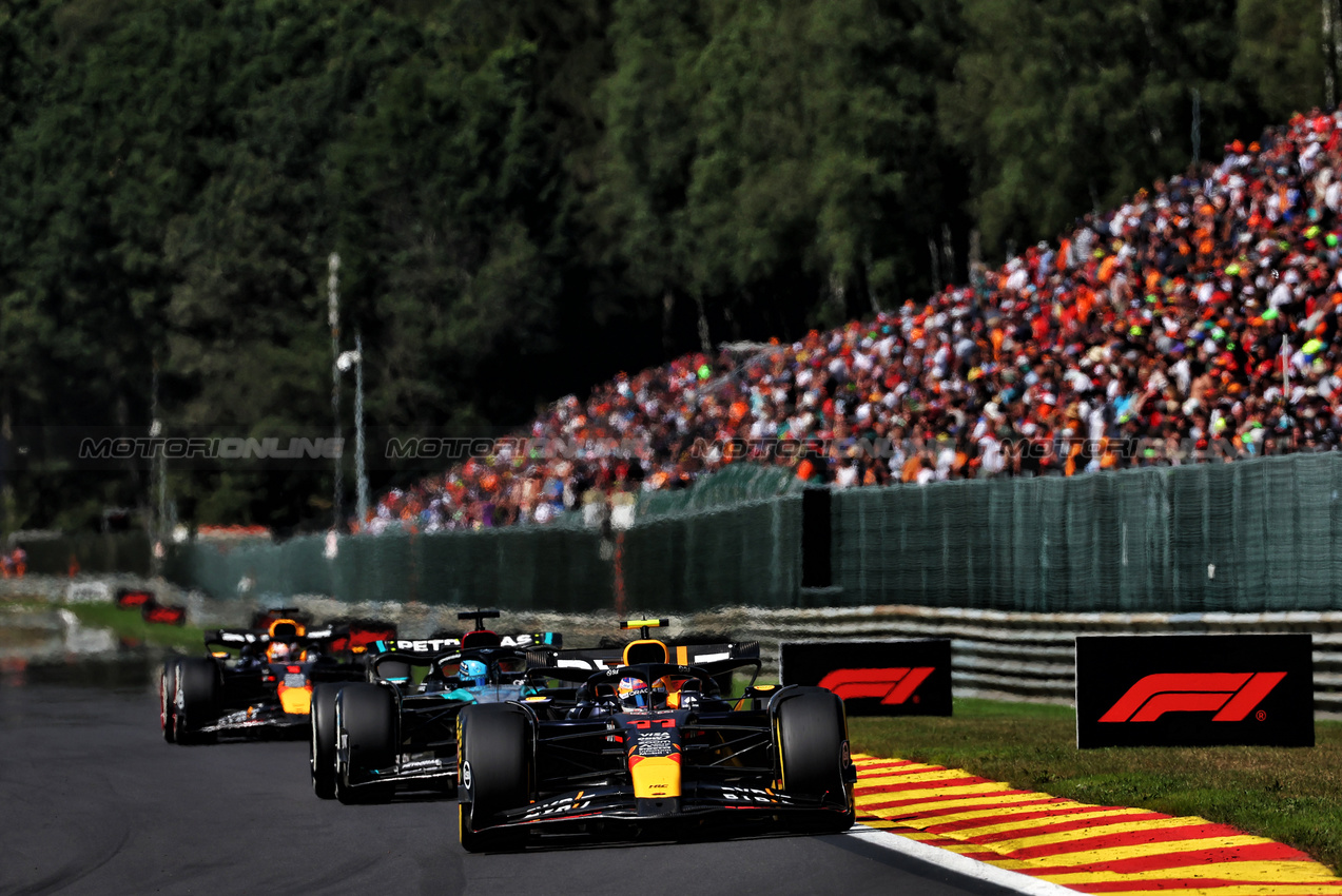 GP BELGIO, Sergio Perez (MEX) Red Bull Racing RB20.

28.07.2024. Formula 1 World Championship, Rd 14, Belgian Grand Prix, Spa Francorchamps, Belgium, Gara Day.

 - www.xpbimages.com, EMail: requests@xpbimages.com © Copyright: Coates / XPB Images