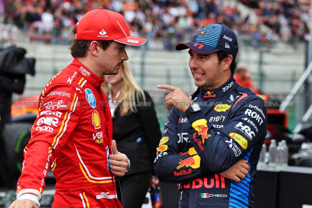 GP BELGIO, (L to R): Charles Leclerc (MON) Ferrari with Sergio Perez (MEX) Red Bull Racing in qualifying parc ferme.

27.07.2024. Formula 1 World Championship, Rd 14, Belgian Grand Prix, Spa Francorchamps, Belgium, Qualifiche Day.

- www.xpbimages.com, EMail: requests@xpbimages.com © Copyright: Moy / XPB Images