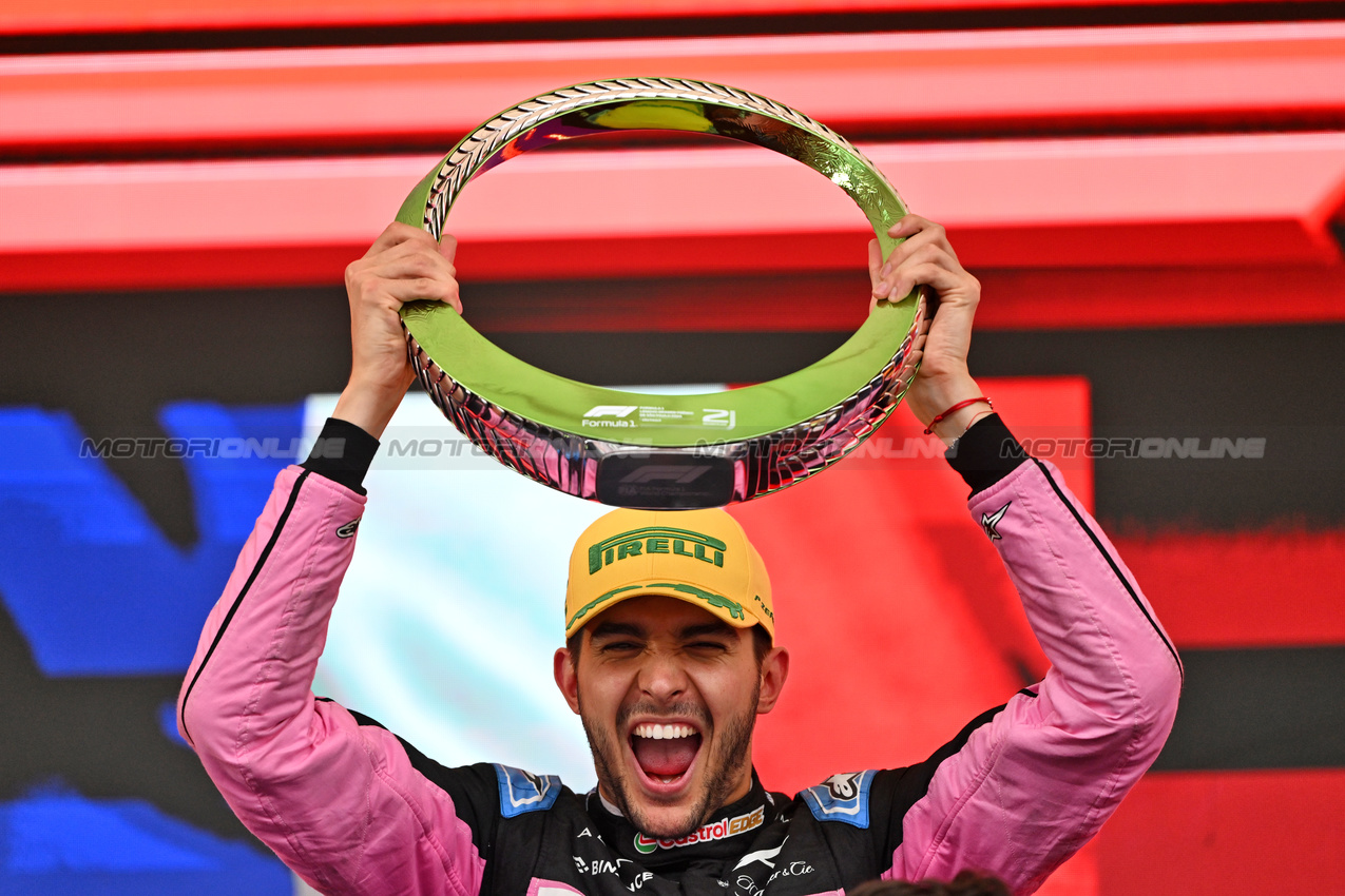 GP BRASILE, Esteban Ocon (FRA) Alpine F1 Team celebrates his second position on the podium.

03.11.2024. Formula 1 World Championship, Rd 21, Brazilian Grand Prix, Sao Paulo, Brazil, Gara Day.

- www.xpbimages.com, EMail: requests@xpbimages.com © Copyright: Price / XPB Images