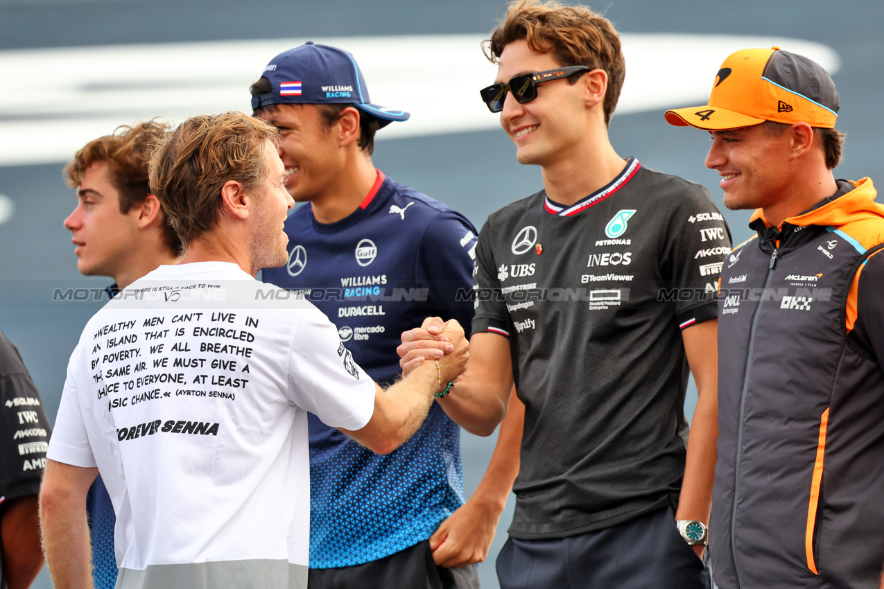 GP BRASILE, Sebastian Vettel (GER) with George Russell (GBR) Mercedes AMG F1 e Lando Norris (GBR) McLaren.

31.10.2024. Formula 1 World Championship, Rd 21, Brazilian Grand Prix, Sao Paulo, Brazil, Preparation Day.

- www.xpbimages.com, EMail: requests@xpbimages.com © Copyright: Batchelor / XPB Images